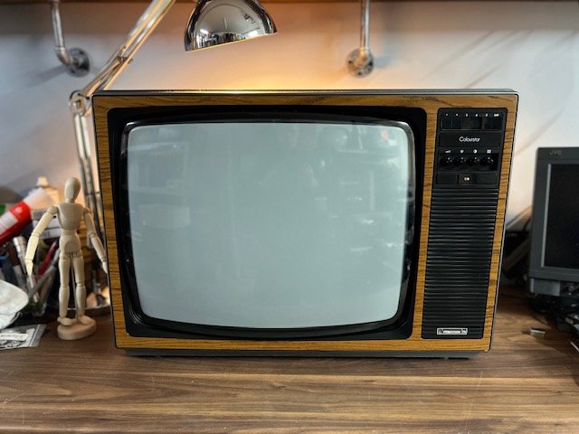 Wood cabinet vintage television for hire with large curved screen