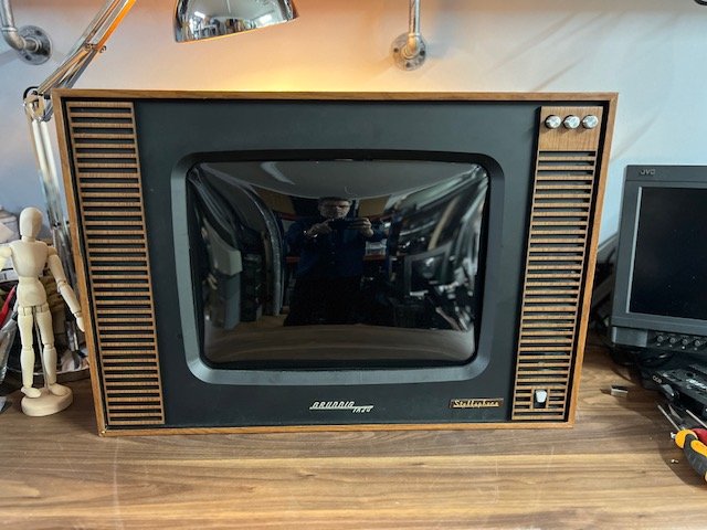 Large 1970s wood retro television for hire with speaker grille