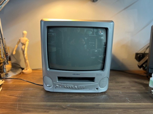 Silver vintage TV with built-in video recorder for hire
