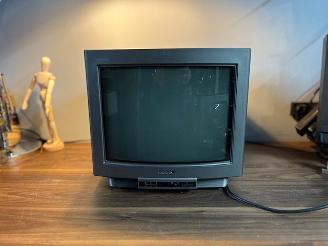 Grey vintage 1990s CRT television for hire