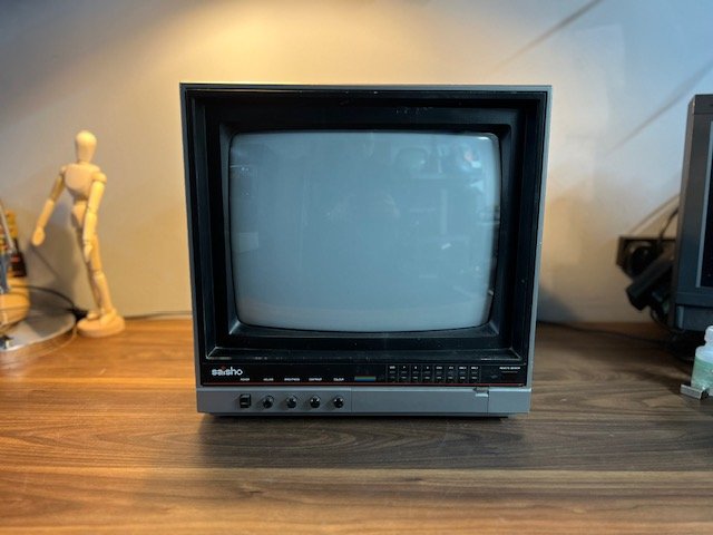 Silver 1980s vintage CRT television to hire