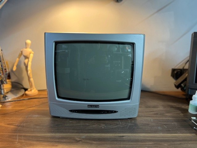 Silver vintage CRT television to hire - compact 1990s TV