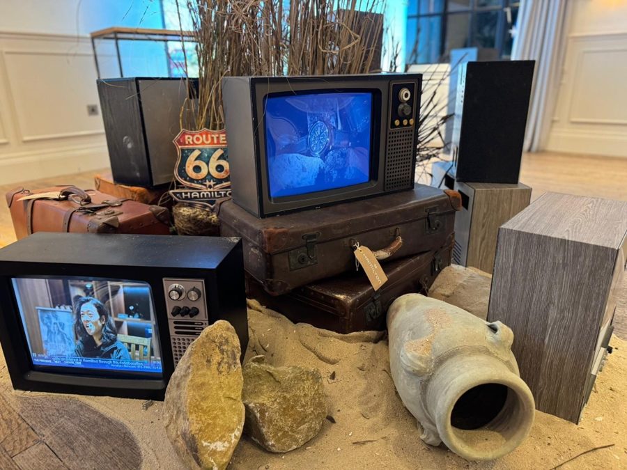 Lovely display created for Hamilton Watches. A combination of vintage TVs and old suitcases set into the sand